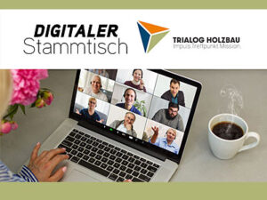 Laptop mit laufender Videokonferenz auf einem Schreibtisch neben einer Kaffeetasse; darüber die Logos „Digitaler Stammtisch“ und „Trialog Holzbau“.